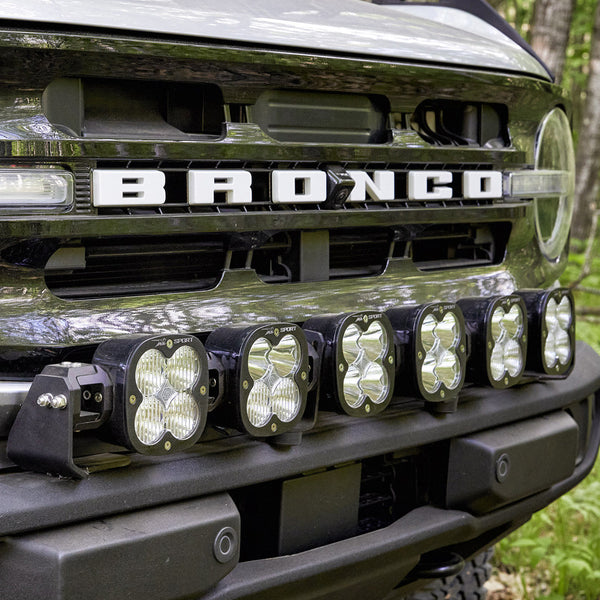Baja Designs Ensemble de phares de pare-chocs Sport raccordables XL Sport - '21-26 Bronco - avec pare-chocs OE en plastique (multi-faisceaux - transparent - câblage à interrupteur à bascule)