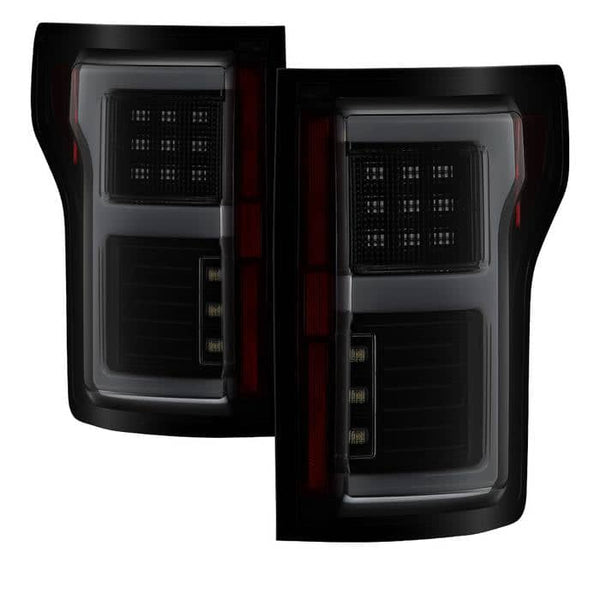 Spyder Black Smoke Light Bar LED Tail Lights | 15-17 Ford F150 (COMPATIBLE WITH REAR BLIND SPOT SENSOR MODEL ONLY)