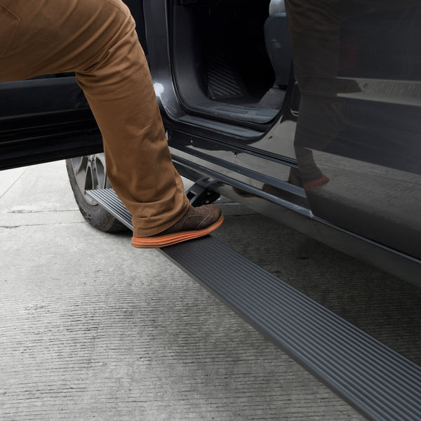 Go Rhino Ensemble de marchepieds électriques VoltStep 15-20 Chevrolet Suburban / GMC Yukon XL 4 portes - noir texturé
