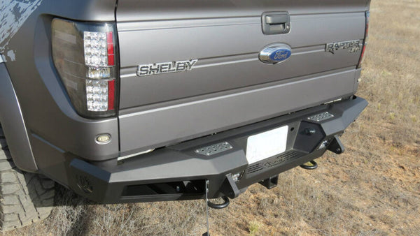Addictive Desert Designs Pare-chocs arrière HoneyBadger avec crochets de remorquage 10-14 Ford F-150 Raptor