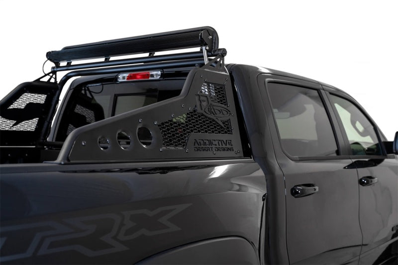 Addictive Desert Designs Support de caisse Race Series avec motif de calandre 2017 21-22 RAM 1500 TRX