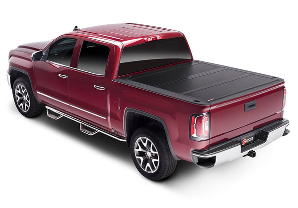 BAK Industries Fibermax Hard Folding Tonneau Cover - 12-18 Ram 1500/ 19-24 Ram 1500 Classic/ 12-26 Ram 2500/3500 6'4" Box with Rambox