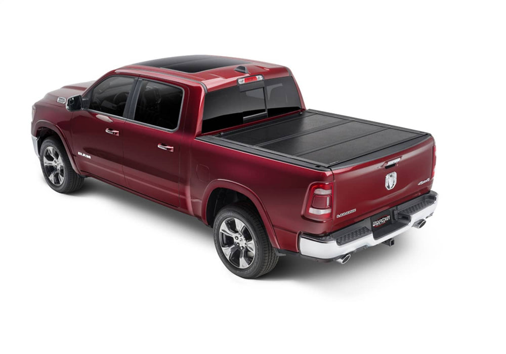 UnderCover Flex Hard Folding Tonneau Cover - Dodge Ram 09-18 1500/ 19-24 1500 Classic 5'7" Box Without Rambox